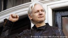 FILE - In this May 19, 2017 file photo, WikiLeaks founder Julian Assange greets supporters outside the Ecuadorian embassy in London, where he has been in self imposed exile since 2012. (AP Photo/Frank Augstein, File) |