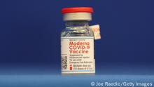 FORT LAUDERDALE, FLORIDA - DECEMBER 23: A bottle of the Moderna COVID-19 vaccine is seen during a press conference on December 23, 2020 in Fort Lauderdale, Florida. Broward Health Medical Center began vaccinating frontline healthcare workers last week with the Pfizer-BioNtech COVID-19 vaccine and are continuing to inoculate frontline caregivers with both of the vaccines after the arrival of the Moderna. (Photo by Joe Raedle/Getty Images)
