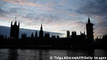 The sun sets behind the Houses of Parliament in central London on December 30, 2020. - EU leaders signed their post-Brexit trade deal with Britain and dispatched it to London on an RAF jet Wednesday, setting their seal on a drawn-out divorce just hours before the UK brings its half-century European experiment to an end. (Photo by Tolga Akmen / AFP) (Photo by TOLGA AKMEN/AFP via Getty Images)