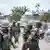 Des soldats des FARDC en patrouille dans le village de Manzalaho, près de Béni (est)