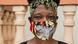 Hearing-impaired garmet maker Agnes Nabgala wears one of Kimuli Fashionability's COVID masks fitted with a recycled plastic panel to allow for lip-leading Hearing-impaired garmet maker Agnes Nabgala wears one of Kimuli Fashionability's COVID masks fitted with a recycled plastic panel to allow for lip-leading