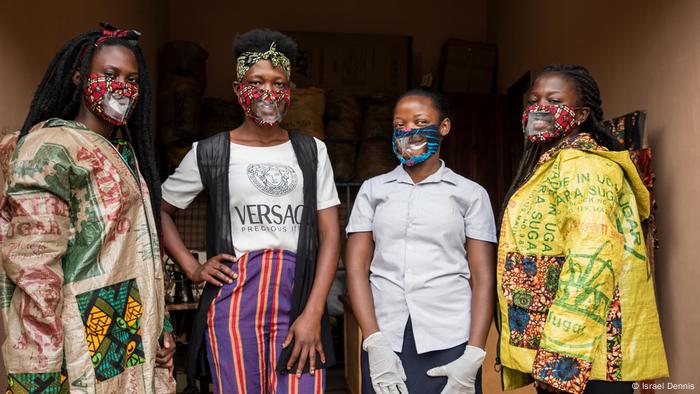 Kimuli Fashionability employees present the corona masks for lip reading in Mpigi, Uganda