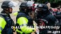 A protester, who claims to be a member of the Proud Boys, confronts police officers as supporters of US President Donald Trump protest outside the US Capitol on January 6, 2021, in Washington, DC. - Demonstrators breeched security and entered the Capitol as Congress debated the a 2020 presidential election Electoral Vote Certification. (Photo by ALEX EDELMAN / AFP) (Photo by ALEX EDELMAN/AFP via Getty Images)