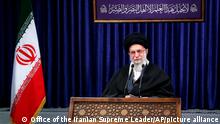 In this picture released by an official website of the office of the Iranian supreme leader, Supreme Leader Ayatollah Ali Khamenei addresses the nation in a televised speech in Tehran, Iran, Friday, Jan. 8, 2021. in Tehran, Iran. Khamenei called to ban the import of American and British vaccines, claiming they are not to be trusted. (Office of the Iranian Supreme Leader via AP)
