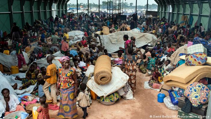 Hundreds of refugees seek shelter in a hangar at the United Nations peacekeeping base in Kaga Bandoro refugee camp in Central African Republic