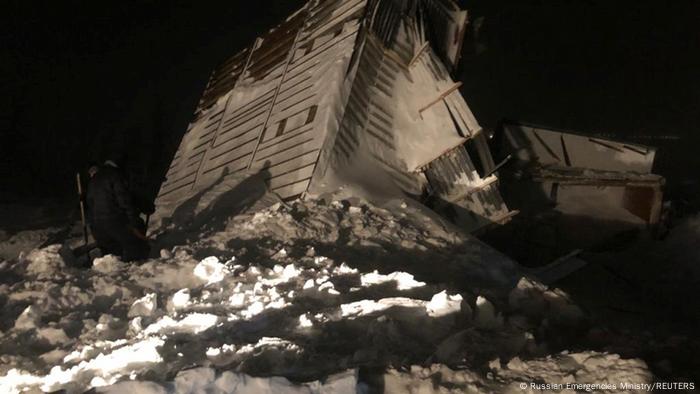 A view shows the accident scene after an avalanche hit a ski resort in the Siberian city of Norilsk