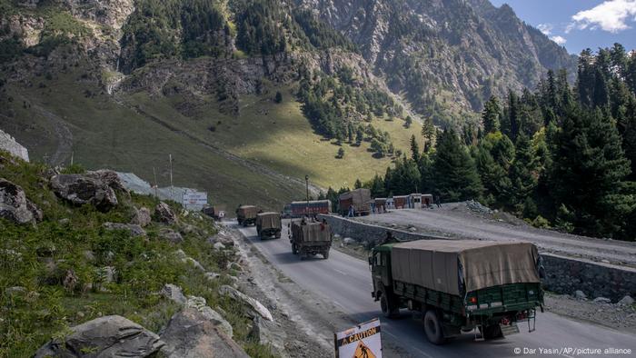 An Indian army convoy heads along the Srinagar-Ladakh highway following the arrest of a Chinese soldier in India close to the Chinese border in Kashmir