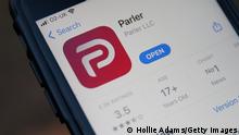LONDON, ENGLAND - JANUARY 09: A general view of the the Parler app icon displayed on an iPhone on January 9, 2021 in London, England. The Parler App popular with right-wing supporters has been suspended from Google's Play store over continued postings by users that incite violence. US President Donald Trump was suspended indefinitely from Twitter after tweets he made encouraged his supporters to break into the Capitol building and five people died in the ensuing violence. (Photo by Hollie Adams/Getty Images)