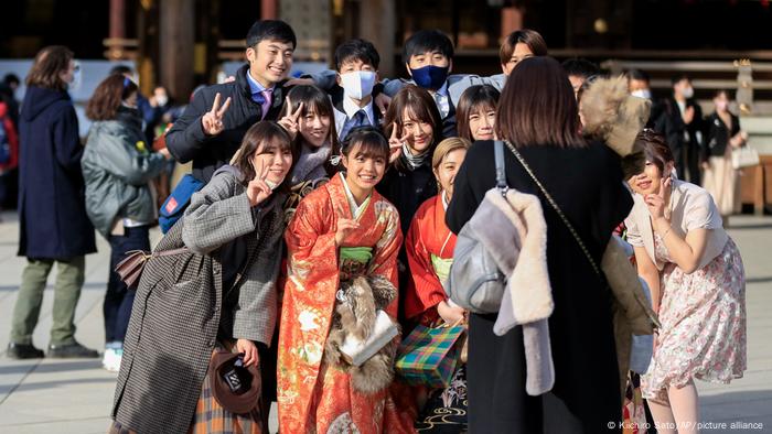 A group of youths pose for a picture