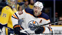 FILE - In this Monday, March 2, 2020, file photo, Edmonton Oilers center Leon Draisaitl (29), of Germany, plays against the Nashville Predators in the first period of an NHL hockey game in Nashville, Tenn. Draisaitl scored four goals as the Oilers won 8-3. NHL leading scorer Leon Draisaitl of the Oilers, Avalanche center Nathan MacKinnon and Rangers winger Artemi Panarin are the finalists for the Ted Lindsay Award. The trophy goes to the league's most outstanding player as voted by fellow players.(AP Photo/Mark Humphrey, File)