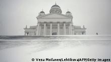 The Helsinki Cathedral seen in heavy snow storm in Helsinki, Finland, on January 12, 2021. - The heavy snowfall is expected to continue until Wednesday, January 13, in Southern Finland. The driving conditions are bad because of the snowfall and slippery roads. (Photo by Vesa Moilanen / Lehtikuva / AFP) / Finland OUT (Photo by VESA MOILANEN/Lehtikuva/AFP via Getty Images)