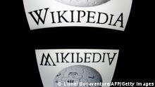 The Wikipedia logo is seen on a tablet screen on December 4, 2012 in Paris. AFP PHOTO / LIONEL BONAVENTURE (Photo by Lionel BONAVENTURE / AFP) (Photo by LIONEL BONAVENTURE/AFP via Getty Images)