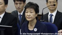FILE - In this May 23, 2017, file photo, former South Korean President Park Geun-hye, front, sits for her trial at the Seoul Central District Court in Seoul, South Korea. South Koreaâ€™s top court upheld 20-year prison term for Park over corruption on Thursday, Jan. 14, 2021. (AP Photo/Ahn Young-joon, Pool, File)