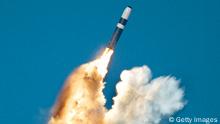 Undated File Photo: A Trident Ii, Or D-5 Missile, Is Launched From An Ohio-Class Submarine In This Undated File Photo. According To A Congressional Report To Be Released May 25, 1999, China Stole U.S. Nuclear Weapons Design Secrets Over 20 Years Through Espionage At Government Laboratories And Will Use The Information To Upgrade Its Own Arsenal. Among The Information Reported To Have Been Stolen, Was Details Of The W-88 Nuclear Warhead, Which Is Carried On The Trident Submarine And Described In The Report As The Most Sophisticated Nuclear Weapon The United States Has Ever Built. (Photo By Getty Images)