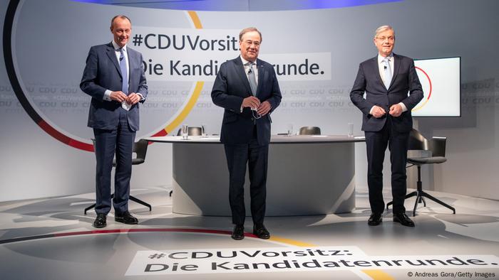 Friedrich Merz, Armin Laschet and Norbert Röttgen on stage Friedrich Merz, Armin Laschet and Norbert Röttgen on stage
