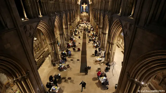 People receive COVID-19 vaccines inside Lichfield Cathedral