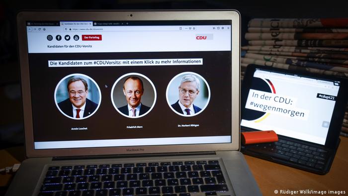 Écran d'ordinateur montrant Armin Laschet, Friedrich Merz, Norbert Röttgen lors du vote du parti numérique de la CDU en janvier 2021