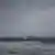 A ship goes behind a sunken ship off Turkey's Black Sea