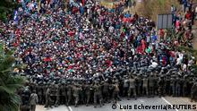 17.01.2021 *** Hondurans taking part in a new caravan of migrants set head to the United States, clash with Guatemalan soldiers as they try to cross into Guatemalan territory, in Vado Hondo, Guatemala January 17, 2021. REUTERS/Luis Echeverria