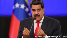 FILE PHOTO: Venezuelan President Nicolas Maduro gestures as he speaks during a press conference in Caracas, Venezuela December 8, 2020. REUTERS/Manaure Quintero/File Photo