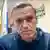 In this image taken from video released by Navalny Life YouTube channel, Russian opposition leader Alexei Navalny speaks in a police station outside of Moscow on January 18