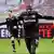 Bayer Leverkusen's Moussa Diaby celebrates scoring the opening goal against Borussia Dortmund
