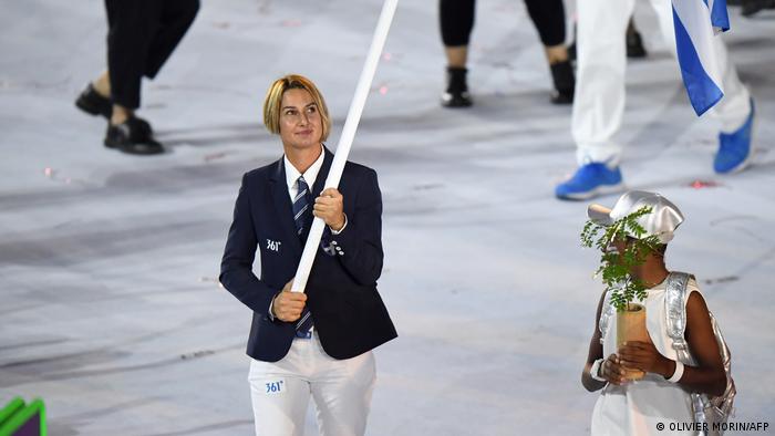Sofia Bekatorou carries the Greek flag at the opening ceremony of the 2016 Olympic Games in Brazil 