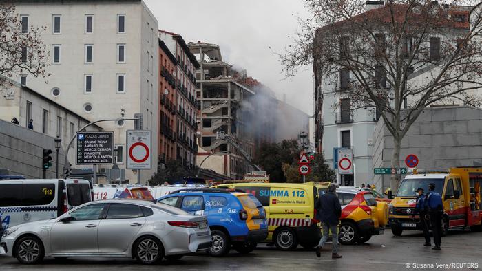 Smoke rises from the site of an explosion in Madrid downtown