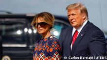 U.S. President Donald Trump and first lady Melania Trump arrive at Palm Beach International Airport in West Palm Beach, Florida, U.S., January 20, 2021. REUTERS/Carlos Barria