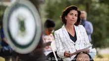 Rhode Island Gov. Gina Raimondo sits during a news conference Monday, June 22, 2020, in Providence, R.I., where she announced that she has signed an executive order to remove the phrase Providence Plantations in the state's formal name from some official documents and executive agency websites. (AP Photo/David Goldman)