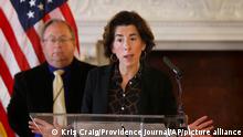 FILE - In this Sunday, March 22, 2020 file photo, Gov. Gina Raimondo gives an update on the coronavirus during a news conference in the State Room of the Rhode Island State House in Providence, R.I. Amid the continuing COVID-19 coronavirus outbreak, Raimondo is warning that the virus’ widening economic fallout could lead to government layoffs in a state that already was facing a $200 million shortfall. Rhode Island lawmakers also approved borrowing up to $300 million to help the state cover its bills. (Kris Craig/Providence Journal via AP, Pool)