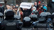 A woman holds a placard reading Russia will be free during a rally in support of jailed Russian opposition leader Alexei Navalny in Moscow, Russia January 23, 2021. REUTERS/Maxim Shemetov
