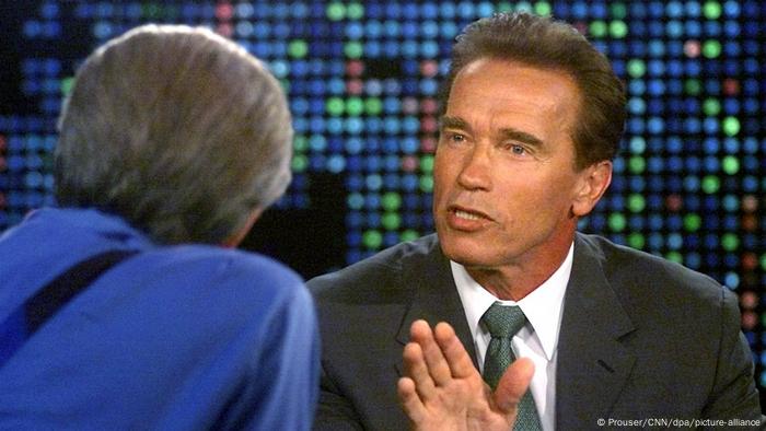 A man speaks in an interview show A man speaks in an interview show