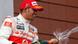 Lewis Hamilton celebrates on the podium. Lewis Hamilton celebrates on the podium.