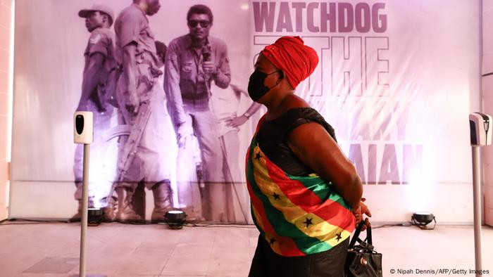 An elderly woman waits in a queue during the lay in state of former Ghana President Jerry John Rawlings in Accra