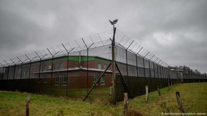 The juvenile detention center with large fences and cameras