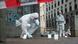 Police collect evidence on the sidewalk of Niddastrasse Police collect evidence on the sidewalk of Niddastrasse