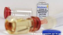  Symbolbild Coronaserum-Impfstoffdose mit Spritze Corona-Impfstoff *** Symbol image Coronaserum vaccine can with syringe Corona vaccine