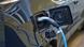 Gambar ilustrasi mobil listrik sedang mengisi baterai Gambar ilustrasi mobil listrik sedang mengisi baterai