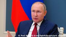Давос: Путин выразил готовность улучшить отношения с Европой