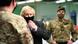 British Prime Minister Boris Johnson meets troops as they set up a vaccination centre in the Castlemilk district of Glasgow, Scotland. British Prime Minister Boris Johnson meets troops as they set up a vaccination centre in the Castlemilk district of Glasgow, Scotland.