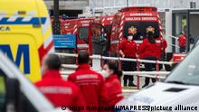 January 29, 2021, Lisbon, Portugal: Ambulances waiting in a queue amid Covid-19 pandemic..Dozens of ambulances line up to drop off patients infected with Covid-19 at the Santa Maria hospital in Lisbon. The wait can take up to 12 hours. While waiting, patients receive assistance inside the emergency vehicles. (Credit Image: © Hugo Amaral/SOPA Images via ZUMA Wire
