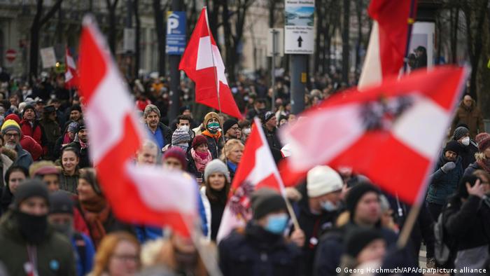 people in Vienna with Austrian flags 