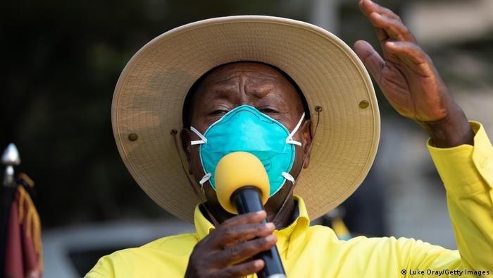 Ugandan President Yoweri Museveni during a rally wearing a face mask