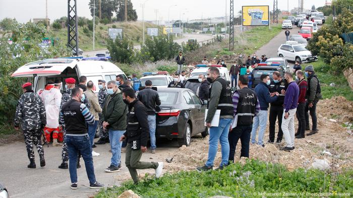 Security forces inspect the scene where Lokman Slim was found shot dead