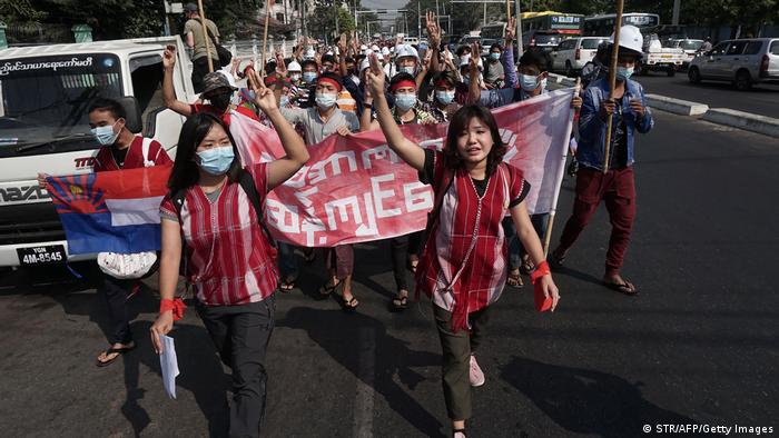 Anti-coup protesters marching in the capital of Myanmar, Yangon