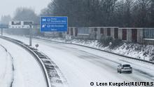 07.02.2021
A car drives in snow on a motorway near Dortmund, Germany, February 7, 2021. REUTERS/Leon Kuegeler