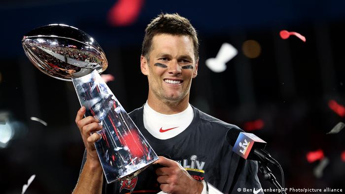  Tampa Bay Buccaneers quarterback Tom Brady (12) holds the Vince Lombardi trophy following the NFL Super Bowl 55 football game against the Kansas City Chiefs