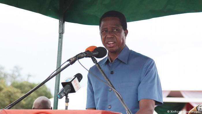 Zambia's President Edgar Lungu speaks into microphones