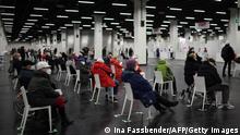 People waiting for their vaccine at a vaccination center in Cologne